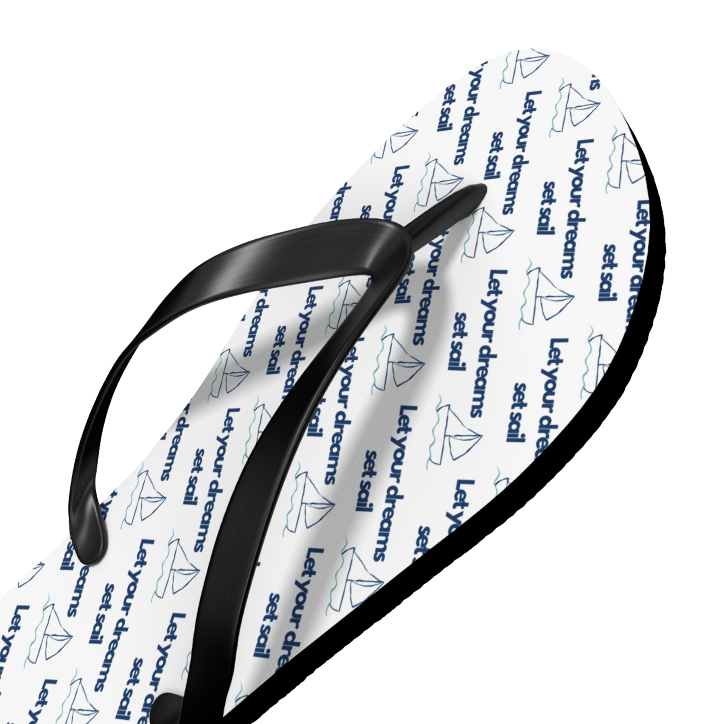 Close-up of cushioned flip flop with detailed coastal print and PVC strap