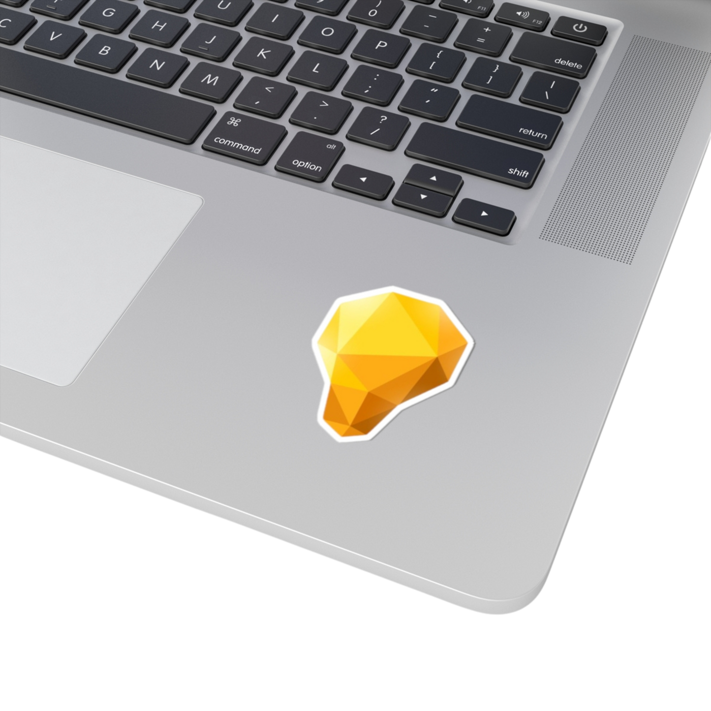 2x2 inch Lightbulb sticker on a laptop – small spark of inspiration