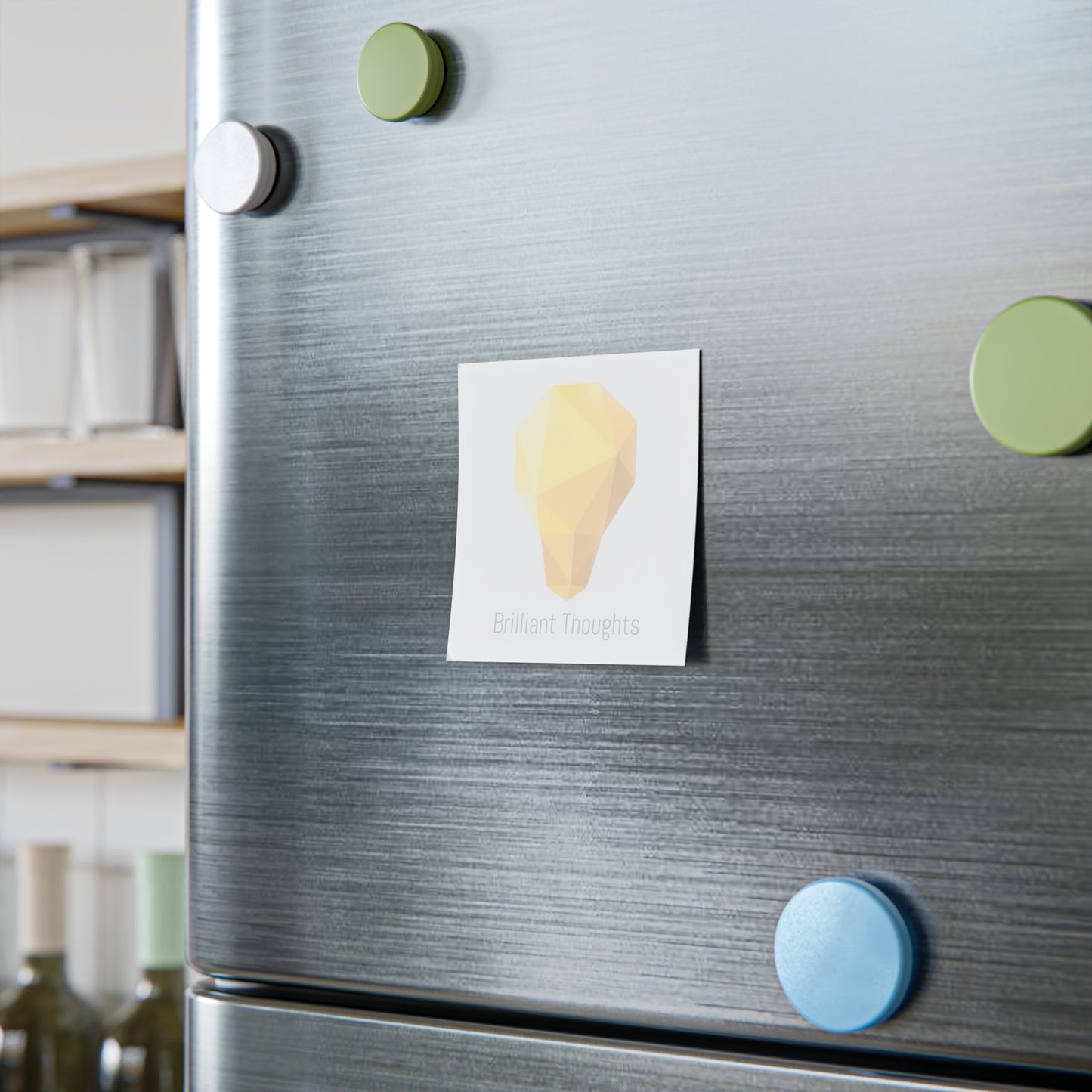 Lightbulb gem Post-it on fridge door with “Brilliant Thoughts” slogan