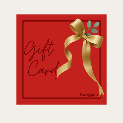 Red gift card with a gold bow and 'Eucalyptus' text on a beige background
