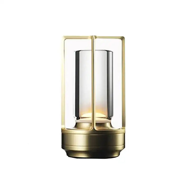 A gold crystal lantern with a white light illuminated from the inside.
