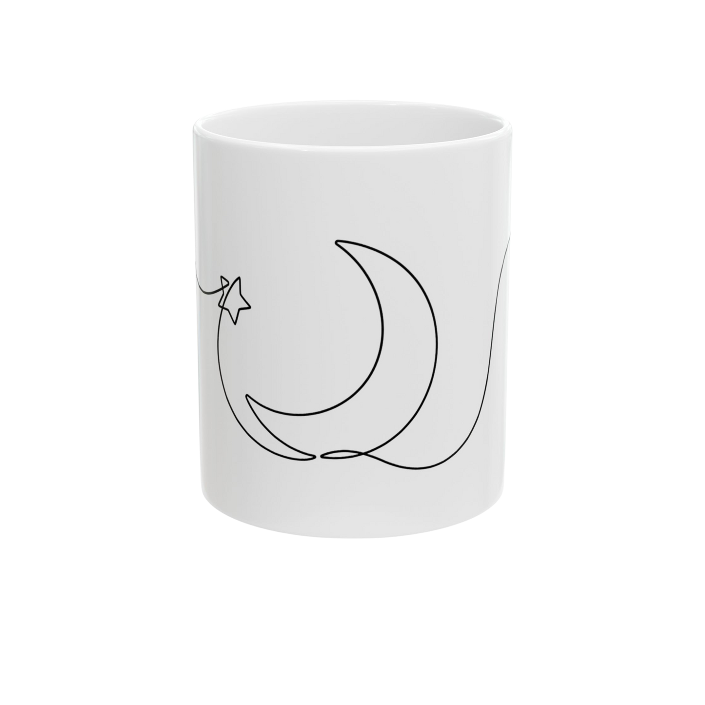 White mug with black moon and star design