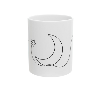 White mug with black moon and star design