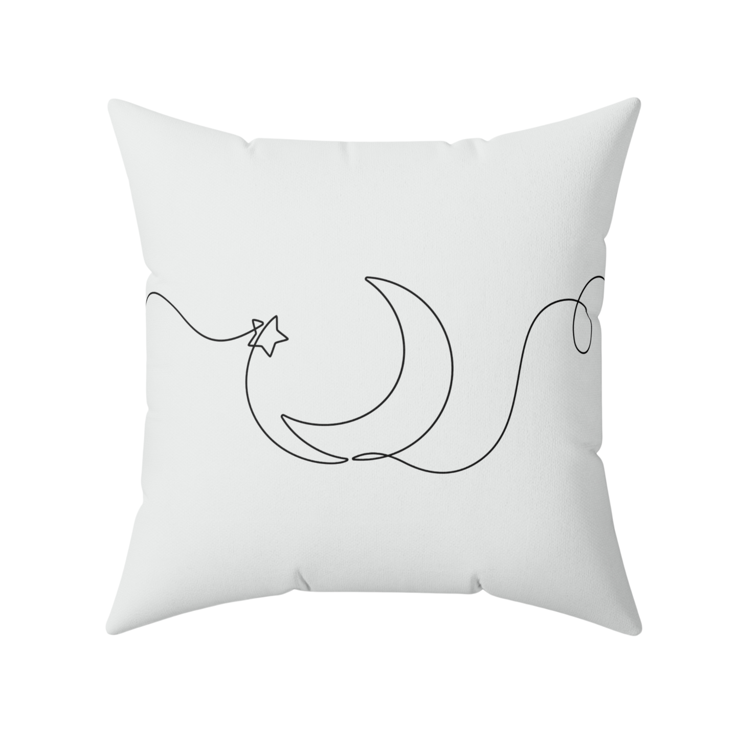 White pillow with black line art design of a crescent moon and star