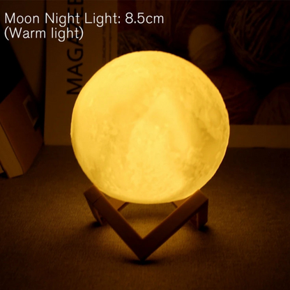 Moon night light with warm glow on a stand in a dimly lit room.