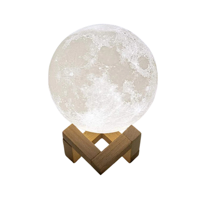 Moon lamp with wooden base on a white background