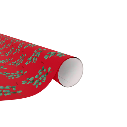 Roll of eucalyptus-themed wrapping paper with green botanical design, ready for gift wrapping