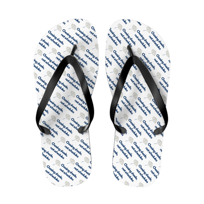 Cast Away flip flops featuring beach umbrella artwork and warm, sandy hues