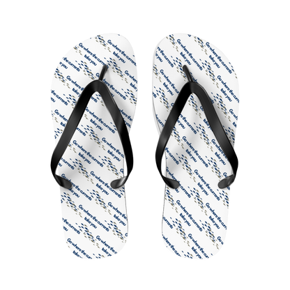 Tide & Tribe flip flops with fish illustration and beach-inspired color palette