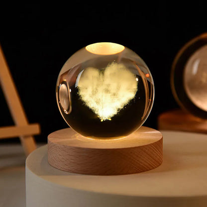 Heart design inside illuminated glass globe for gifting