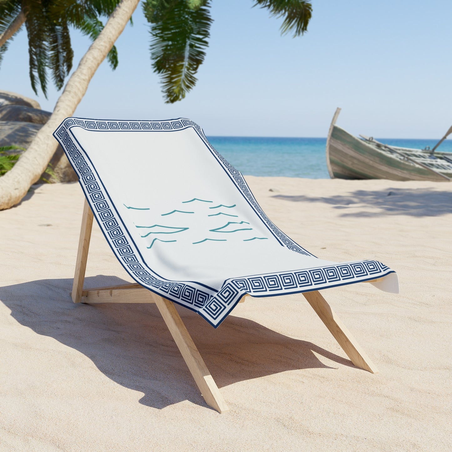 Mediterranean beach towel draped over beach chair – stylish towel with vibrant print for summer lounging