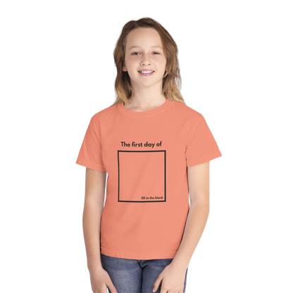 Child wearing terracotta “My First Day Of ___” tee – front view