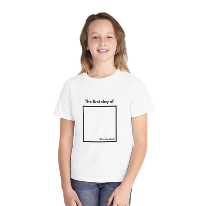 Child wearing white “My First Day Of ___” tee – front view