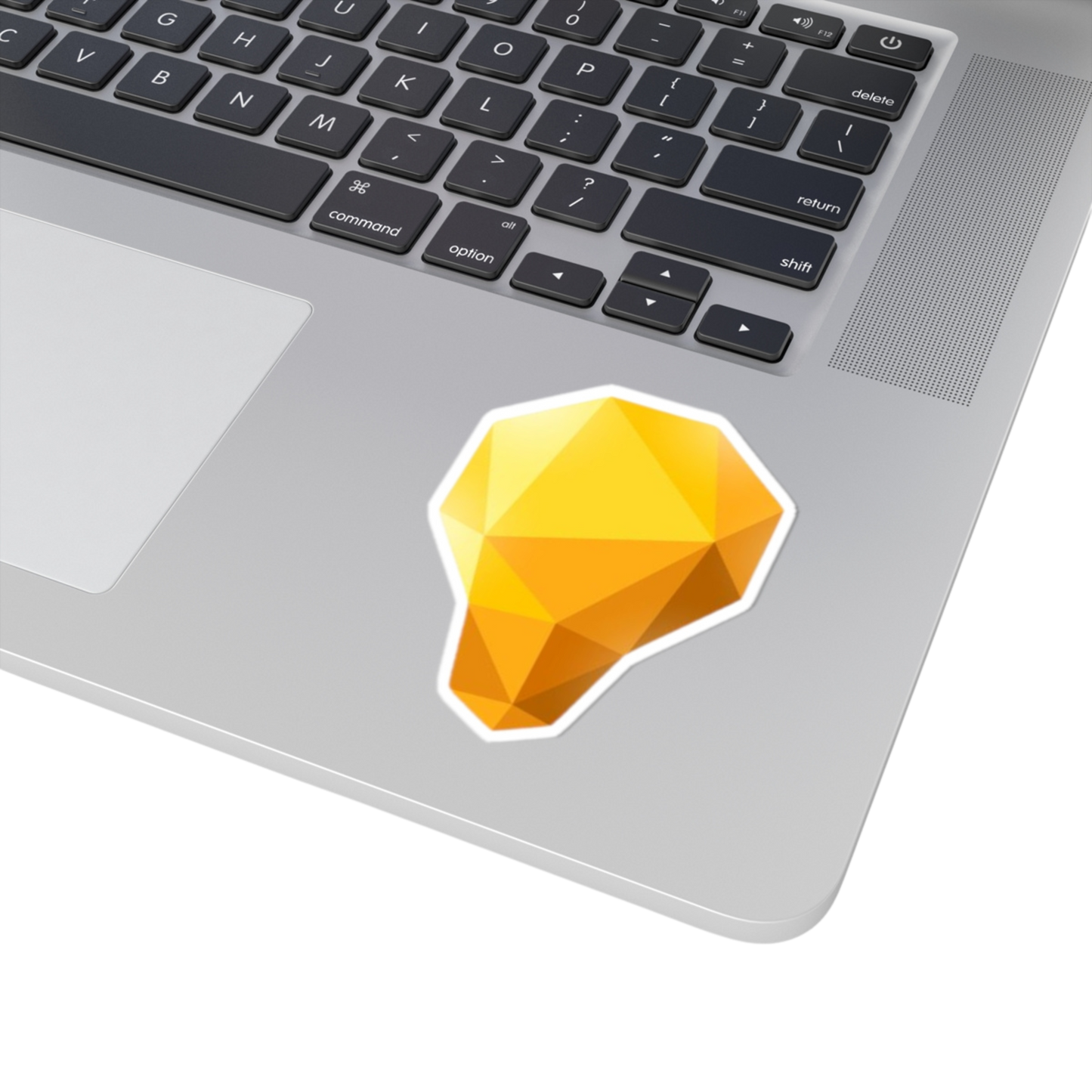 3x3 inch Lightbulb sticker on a laptop – lighting up your creative flow