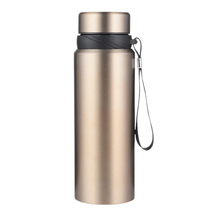 Golden thermal flask for hot drinks during cold nights outdoors