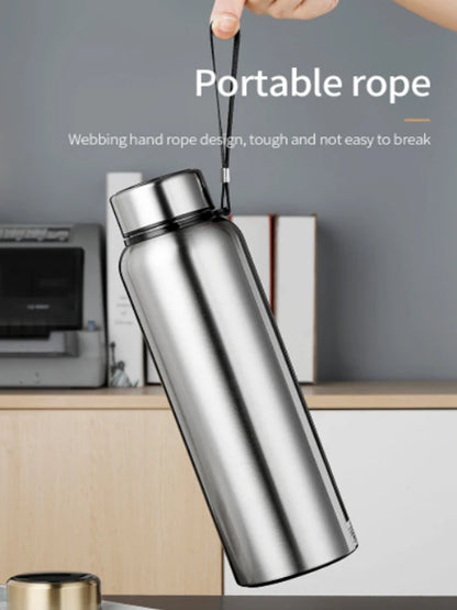 Thermal bottle with attached rope handle for easy carrying